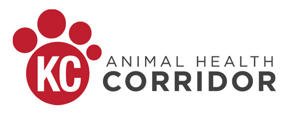 A red paw print graphic with the letters 'KC' inside the center pad sits to the left of the words 'Animal Health Corridor' in bold black and gray text.