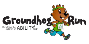 Cartoon groundhog in running gear smiles while jogging beside text 'Groundhog Run,' with note 'Benefiting the children of Ability KC.'